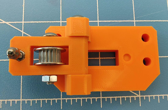 Belt Tension Arm inserted into Idler Mount