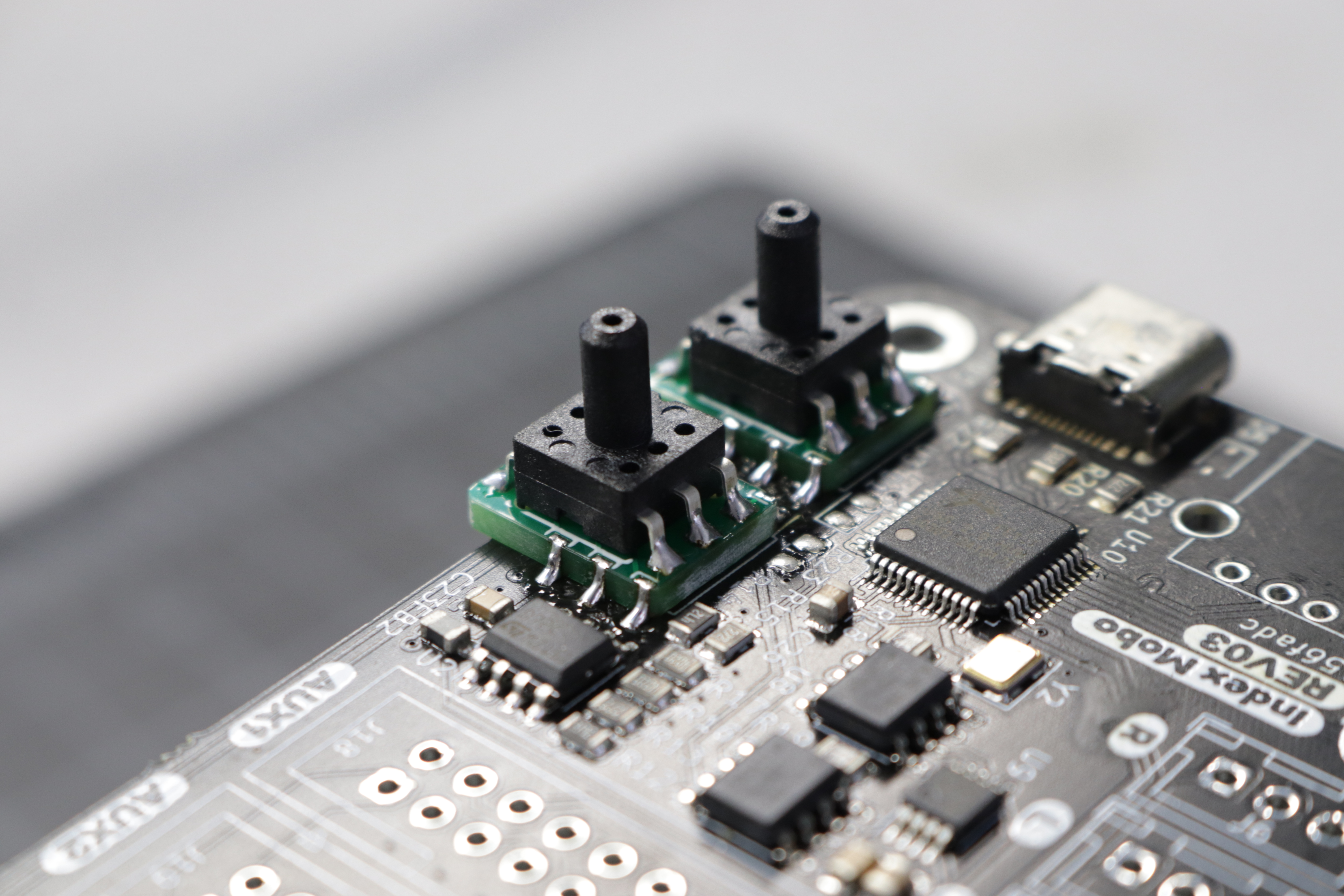 A photo of the second interposer board soldered in place on the motherboard