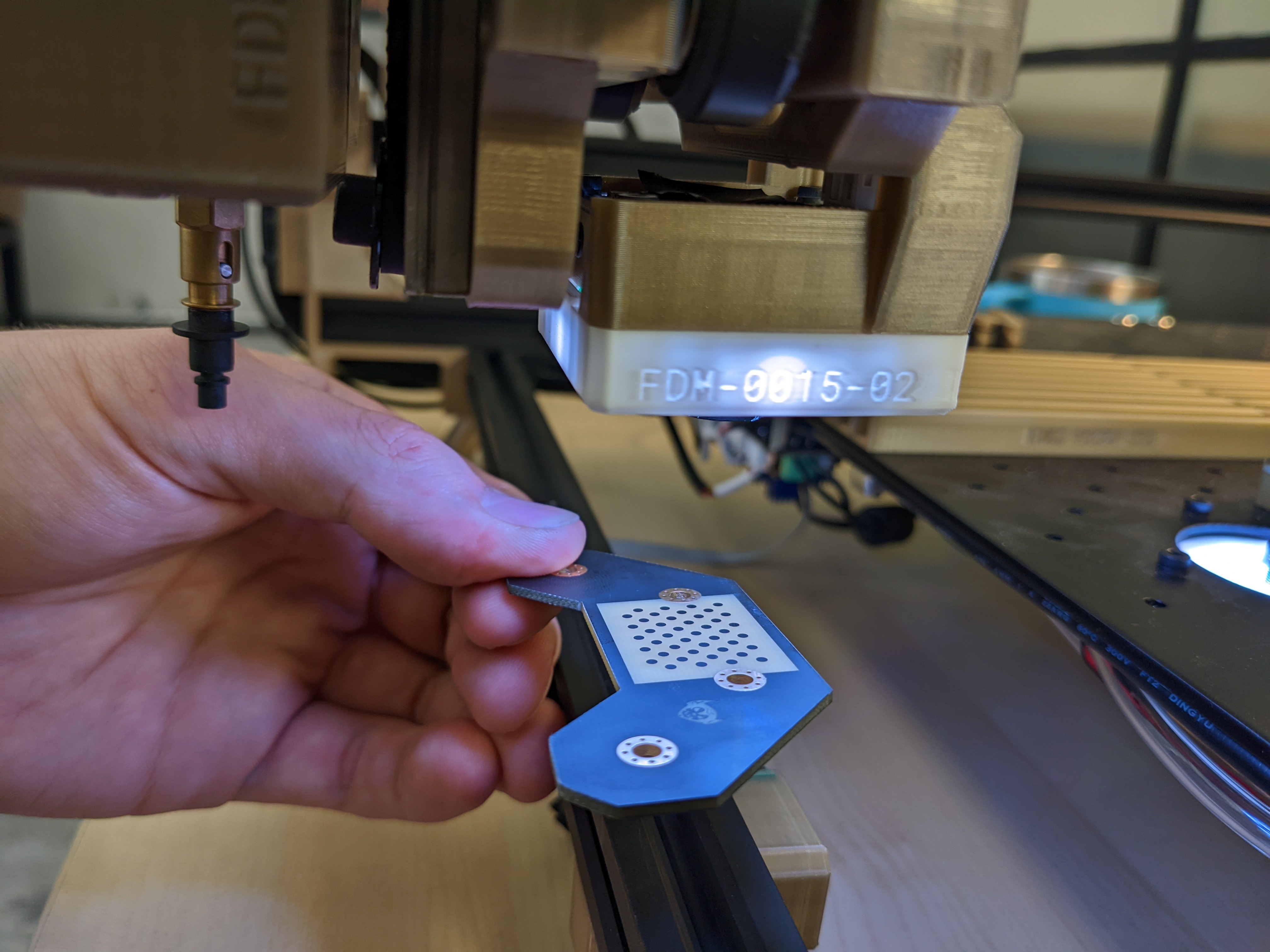 holding the calibration grid below the camera